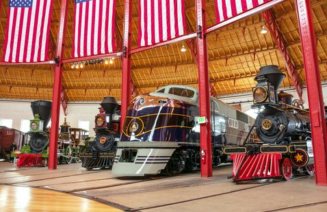 Photograph of trains in a train yard.