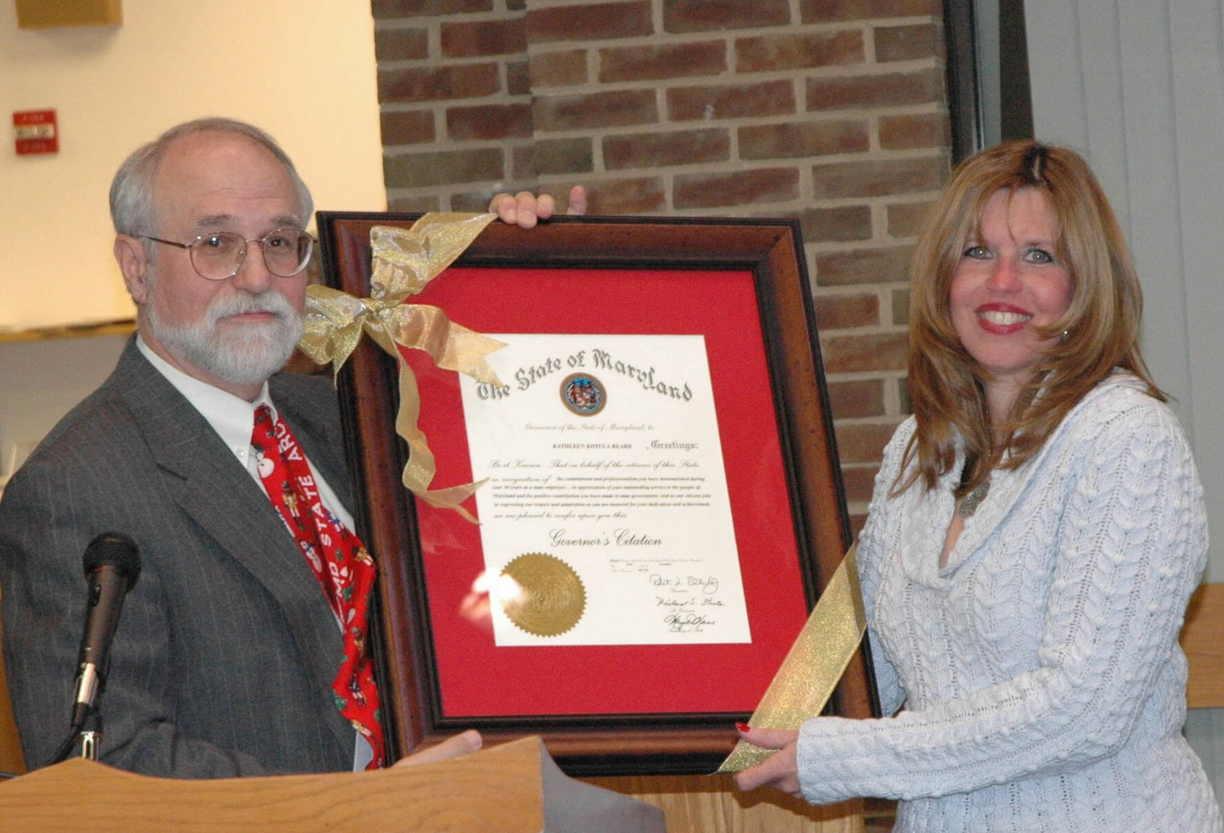 Dr. Papenfuse and Kathy Beard at retirement ceremony